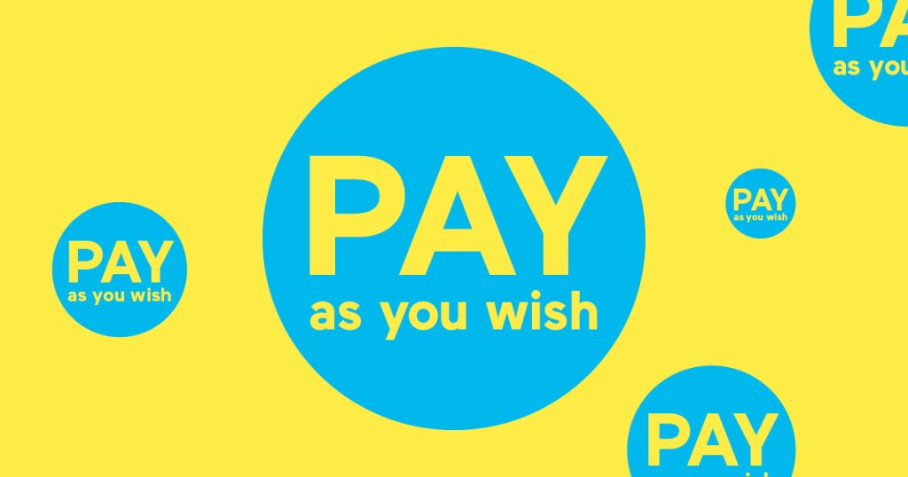 Blue circles with yellow text PAY as you wish on a yellow background.